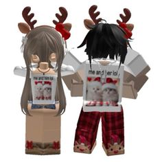 two paper dolls with reindeer antlers on their heads, one holding a photo and the other wearing pajamas