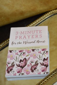 3 - minute prayer book for the worded heart, featuring pink flowers and gold trim