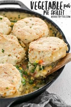 biscuits and peas are being cooked in a skillet