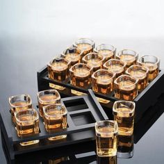 Raise the Bar with this set of Square Shot Glasses Introducing our Square Shot Glasses with Wooden Holder, the perfect addition to any home bar. These cool shot glasses have a capacity of 2 ounces, making them the perfect size for a quick shot. Use them for a fun night with friends, or carry them to your favorite sporting event or concert.  The shot glasses are made of thickened glass, giving them a sturdy and durable feel and dishwasher safe, making cleanup a breeze. The unique square shape on Cool Shot Glasses, Wine Glass Cup, Wooden Cup, Drinkware Sets, Shot Glass Set, White Wine Glasses, Glass Bar, Wine Glass Holder, Wine Glass Set