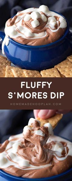 a person dipping marshmallows on top of s'mores dip in a blue bowl