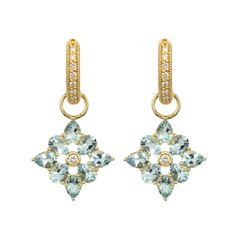 From the JudeFrances Provence Collection, the Provence Four Petal Earring Charms feature petals of aquamarine stones with a white diamond center in 18K yellow gold. Hoops and earring charms are sold separately. Total diamond weight: 0.04 ct Measures: 14 x 14 mm Handmade Gifts For Girlfriend, Trio Necklace, Pave Bangle, White Diamond Earrings, Aquamarine Earrings, Halo Earrings, Earring Charms, Aquamarine Stone, Gems Jewelry