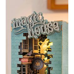 an altered photograph of a house with the words magic house on it's front