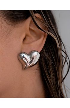 Smooth, fluid heart-shaped silhouettes give an organic-inspired look to these bold drop earrings styled with post back closures. 1" diameter Post back Silvertone plate or goldtone plate Imported Personalised Jewellery Necklaces, Sensitive Ears Earrings, Statement Stud Earrings, Luv Aj, Summer Stuff, Ear Earrings, Diamond Shop, Cool Summer, Silver Drop Earrings