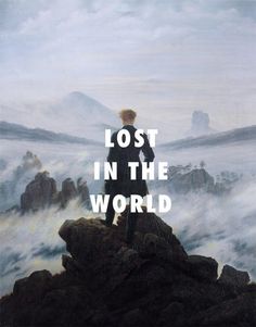 a man standing on top of a mountain with the words lost in the world