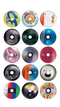 several different types of cds are shown in this image, including one with the letter d on it