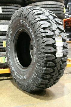 several tires stacked on top of each other in a warehouse