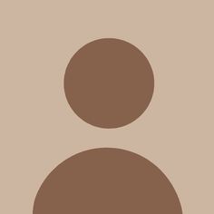 an image of a person's face in the middle of a brown and tan background