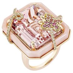 An ancient Kunzite ring with a butterfly studded with pink opal and pink tourmaline that add to the beauty of the ring and with studded diamonds on both sides of the Kunzite that add to the beauty of the ring is shown. This ring is composed of rose gold and is quite attractive. Kunzite Fancy Ring in 18Karat Rose Gold with Pink Tourmaline, Pink Opal and White Diamond. Kunzite: 42.79 carat, 22X17mm size, octagon shape. Pink Tourmaline: 0.09 carat, 1.40mm size, round shape. Pink Tourmaline: 0.09 ca Luxury Octagon-shaped Diamond Jewelry, Kunzite Ring, Peach Jewelry, Octagon Shape, Fancy Rings, Pink Opal, Heel Boots, A Butterfly, Morganite