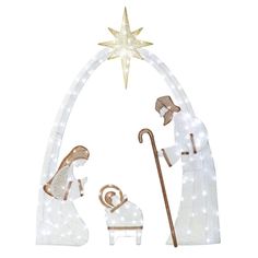 an illuminated nativity scene with the birth of jesus and baby jesus, in white