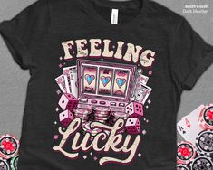 a t - shirt that says feeling lucky with dices and hearts on the front