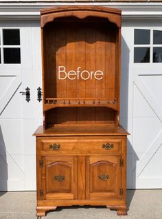 an old wooden hutch with the words before painted on it