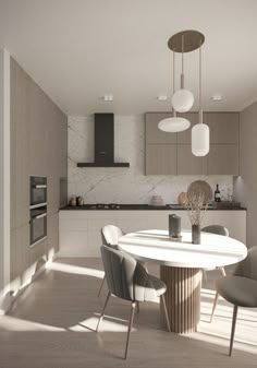 a white table and some chairs in a room