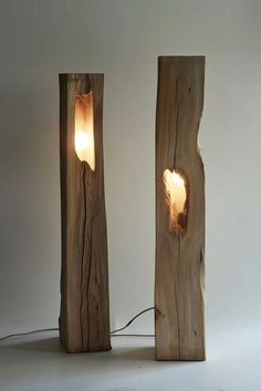 two pieces of wood that have been turned into lamps