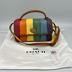 Condition- Brand New Size- N/A Measurements- In Pictures Color- Rainbow Brand- Coach Description- Item Is New Tags Are Not Attached Comes With Everything You See In The Pictures Has A Small Scuff Mark On Coach Tag (See Last Picture) Shipping: Items Are Shipped Monday-Friday Via Usps Priority 2/3 Day Mail With A Tracking Number. (Label Provided By Poshmark) Questions: Please Feel Free To See Ask Any Questions Most Questions Are Answered Immediately. ~Discounts & Bundles: Receive 10% Off 2 Or More Rainbow Quilt, Branding Coach, Color Rainbow, Bags Coach, Suitcases, Pink Brown, Monday Friday, Hand Bags, Coach Bags