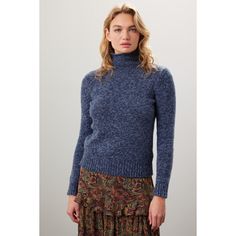 Blue knit (65% wool, 35% nylon). Sweater. Long sleeves. Turtleneck. Pull on. 23" from shoulder to hemline. Imported. Fitted Wool Knitted Top, Blue Long Sleeve Turtleneck With Ribbed Cuffs, Stretch Wool Tops For Fall, Winter Workwear Textured Knit Turtleneck, Blue Turtleneck Sweater For Layering, Blue Turtleneck For Winter Layering, Blue Cashmere Sweater For Spring, Long Sleeve Blue Cashmere Sweater, Blue Cashmere Sweater For Fall