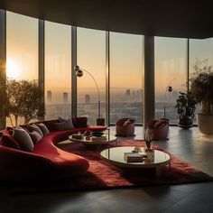 a living room filled with lots of furniture and large windows overlooking the cityscape