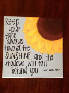 a sunflower with a quote on it that says keep your face always toward the sunshine and the shadows will fall behind you