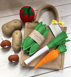 some carrots and other vegetables are on a bag