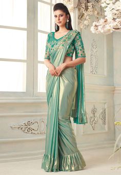 Light green silk party wear saree 7103  Desc:  Color : Light Green Fabric : Silk Work : Sequins   Embroidery Wash Care : Dry clean Sleeve Style : Half Sleeve Long Sleeves : Done only in Custom Stitch Sleeves Lining : Done only in Custom Stitch Bust Size : 32 to 42 Inches Occasion : Festival   Christmas   Diwali   Eid   Kitty Party   Party Wear   Engagement. With Express Free Shipping and Custom Stitching, Buy Indian Wedding Party Wear Saree Light green silk party wear saree 7103 online in USA, U Engagement Saree, Saree Wearing, Saree Wearing Styles, Fancy Sarees Party Wear, Ruffle Saree, Half Saree Designs, Saree Designs Party Wear, Party Wear Saree, Green Saree