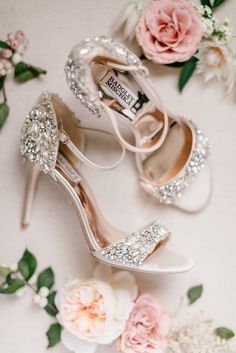 the bride's wedding shoes and flowers