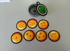 a group of oranges sitting on top of a table next to an open can