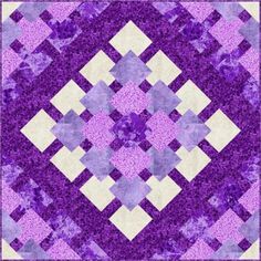 a purple and white quilt with squares in the center, on top of each other