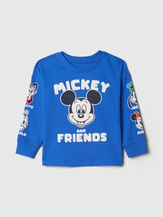 Soft cotton graphic T-shirt.  Crewneck.  Long sleeves.  Mickey Mouse and friends graphics at front and sleeves.  Straight, easy fit.  Hits at the hip.  Sizes range from baby to toddler. Blue Mickey Mouse T-shirt For Disney Events, Playful Blue Mickey Mouse Top, Blue Mickey Mouse Crew Neck T-shirt, Blue Mickey Mouse Playful T-shirt, Mickey Mouse And Minnie Mouse, Playful Cotton Mickey Mouse T-shirt, Baby Mickey Mouse, Baby Mickey, American Brand