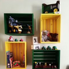 three shelves with toy trucks and toys on them