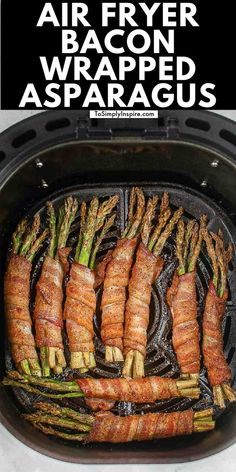 black air fryer basket with several bunches of asparagus wrapped in crispy bacon. Bacon Wrapped Asparagus Recipes, Air Fry Bacon, Asparagus Bundles, Low Carb Side Dish, Air Fryer Bacon, New Air Fryer Recipes, Asparagus Recipes Roasted, Wrapped Asparagus