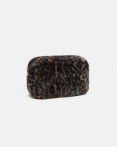 Jumbo Noor Faux Fur Travel Pouch in Dark Leopard Casual Travel Bag With Rectangular Case, Casual Travel Bag With Rectangular Shape, Casual Rectangular Travel Bags, Packable Rectangular Cosmetic Bag For Travel, Casual Rectangular Travel Cosmetic Bag, Casual Rectangular Cosmetic Bag For Travel, Brown Travel Clutch Cosmetic Bag, Packable Travel Accessories Pouch For On-the-go, Cosmetic Bag With Luggage Sleeve Pouch