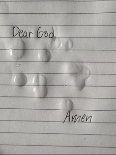 a piece of paper with writing on it that says dear god and an image of water drops