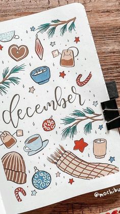 an open notebook with the words december written on it