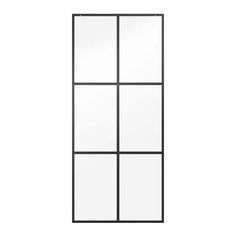 a black and white door with four panes