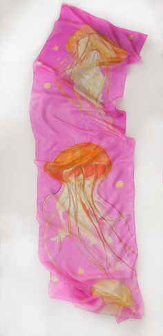 "HAnd painted silk scarf- Jellyfish dance. Silk scarf in fuchsia and orange. PAinted silk scarf. Bright summer scarf hand painted. Long fashion scarf. Fuchsia fashion scarf. Designer scarves Trendy scarves. Ocean, sea shawl, scarf. August Birthday gifts, Pink silk scarf with ocean motives. Silk painting. Neon scarves. ♥This bright, unique scarf is 17 by 71 inches and paint on pure silk! Luxury silk scarf painted. ♥Washing by hand in cold water. I never use stencils or guides.All my scarves are o Artistic Summer Beach Scarves, Neon Scarf, Spring Shawl, Pink Silk Scarf, Luxury Silk Scarves, Trendy Scarves, Unique Scarf, Gifts Pink, Summer Shawl