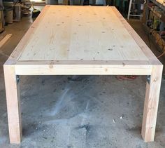 a table made out of wood in a garage