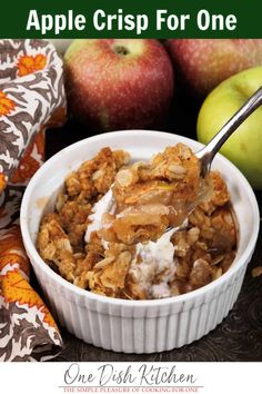 an apple crisp for one in a white bowl