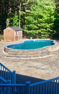 an above ground pool with steps leading up to it