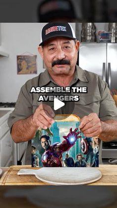 an older man holding up a box with the caption assemble the avengers