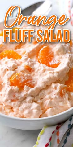 orange fluff salad in a white bowl with text overlay