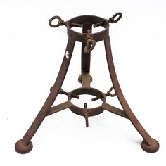 an old metal stand with two handles on it