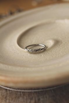 This handmade ring is made entirely from sterlings sterling and features a small floral design in the center. The beautiful pattern reminds me of the delicate blue forget-me-not flowers. This ring can serve as a reminder of all the lovely memories and love. Fun fact: In 15th-century Germany, it was supposed that the wearers of the flower would not be forgotten by their lovers. Legend has it that in medieval times, a knight and his lady were walking along the side of a river. He picked a posy of Silver Smithing Jewelry, Silver Rings Aesthetic, Simple Silver Rings, Forget Me Not Ring, Funky Jewelry, Forget Me Not, 15th Century, Jewelry Inspo, Dream Jewelry