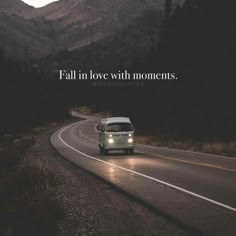 a van driving down a road with the words fall in love with moments