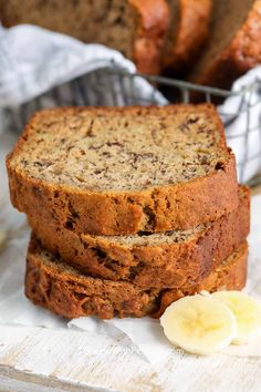 three slices of banana bread sitting next to each other