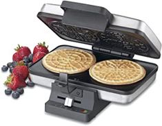 two waffles are being cooked on an electric griddle