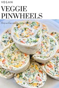 vegan veggie pinwheels on a white plate with text overlay