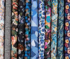 many different types of ties are lined up together