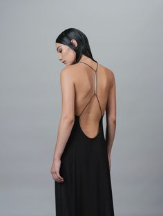 AN OPEN BACK DRESS, FEATURING A SCULPTURAL BIOMORPHIC SPINE METAL TRIM, ACCENTUATES THE BEAUTY OF THE HUMAN FORM. HIGH STRETCH AND COMFORT-FEEL JERSEY. MAXI LENGTH. STYLED WITH: BUTT BAG MESH HAND BAG HUMAN MESH BAG STRETCH JERSEY GRACE LING SIGNATURE LOGO ENGRAVED SHIPS IMMEDIATELY SHIPS WORLDWIDE Open Back Outfit, Raccoon Hands, Open Back Maxi Dress, Open Back Dress, Human Form, Inspo Board, Open Back Dresses, Metal Trim, Back Dress