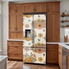 the refrigerator is decorated with flowers and leaves