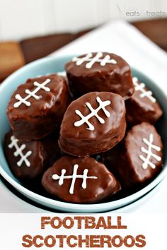 chocolate football cookies in a blue bowl on a table